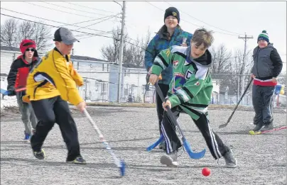  ?? GREG MCNEIL/CAPE BRETON POST ?? Jersey day was observed at Robin Foote Elementary in Westmount on Thursday as a show of support for the Humboldt Broncos junior hockey team that was involved in a tragic bus crash. Students wore their jerseys to class and for road hockey games at...