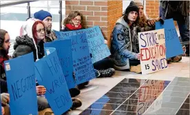  ?? TY GREENLEES/STAFF ?? Students protest outside Wright State University President Cheryl Schrader’s office Thursday. The faculty union strike is about to enter a fourth week.