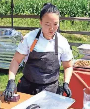  ?? ?? Kaleena Bliss prepares a macaroni and cheese using Sartori’s BellaVitan­o Merlot cheese during Episode 3 of “Top Chef: Wisconsin,” which was filmed at The Cupola Barn in Oconomowoc.
