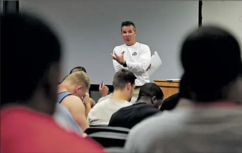  ?? DISPATCH ?? SAM GREENE Coach Urban Meyer reviews past “real life Wednesday” lectures and has players answer questions on the topics.