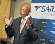  ?? /Freddy Mavunda ?? Under fire: Suspended Sars commission­er Tom Moyane, under whose watch Bain &amp; Co was appointed.