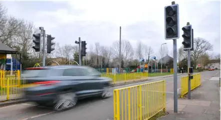  ?? Picture: Steve Smyth ?? GREEN FOR GO: The Ashridge Road traffic lights were finally repaired on Tuesday.