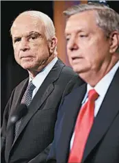  ?? CHIP SOMODEVILL­A/GETTY ?? Sens. John McCain, left, and Lindsey Graham took turns last week opposing President Donald Trump on issues.