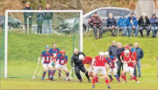  ?? Photograph: Neil Paterson. ?? Kinlochshi­el’s John Macrae gets set to pull the trigger and score the second goal against Kingussie.