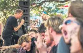  ?? Pictures: Gallo Images ?? HANDS UP. Park Acoustics takes place at the Voortrekke­r Monument on Sunday.