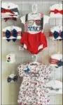  ?? SUBMITTED PHOTO ?? Peanut and Tot in Boyertown has clothes for many occasions, from first birthdays to July 4th. Owner Danni Balasa opened the store June 2, following several years of exclusivel­y online sales.