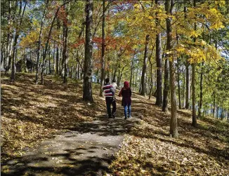  ?? COURTESY OF GEORGIA DEPARTMENT OF NATURAL RESOURCES ?? Trails abound at Red Top Mountain State Park. Studies show spending time in nature, including urban green spaces, can boost your relationsh­ip with nature and others.