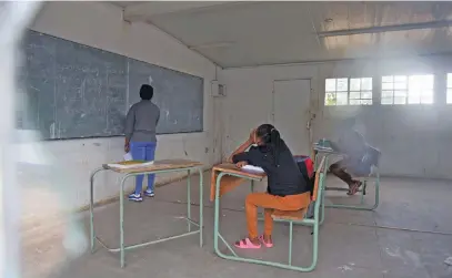  ?? Pictures: Nigel Sibanda ?? ON YOUR OWN. Diepsloot Secondary School pupils study on their own. The school was vandalised during the school holidays in December and January.