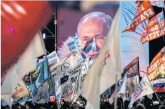  ?? AFP ?? Supporters listen to presidenti­al candidate, President Vladimir Putin during a rally and a concert celebratin­g his fourth election victory yesterday.