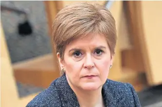  ??  ?? Top: Chancellor Rishi Sunak, right, with Housing Secretary Robert Jenrick, hosting a roundtable for business representa­tives in Waterloo, London. Above: First Minister Nicola Sturgeon will look carefully at the mass testing pilot.