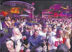  ?? Chase Stevens Las Vegas Review-Journal @csstevensp­hoto ?? Attendees dance and listen to music during the grand opening weekend of Kaos on April 5. Seven months later, the dayclub and nightclub at the Palms has been shut down.