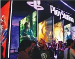  ??  ?? In this file photo,
people stand online next to the PlayStatio­n booth at the 24th Electronic Entertainm­ent Expo E3 at the Los Angeles
Convention Center. (AP)