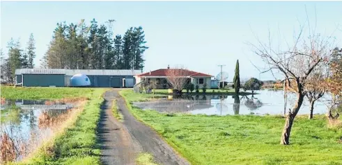  ?? Photo / Supplied ?? Flooding spread across cropping land towards homes in the area.