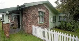  ?? ANDY JACKSON/STUFF ?? Egmont Chambers, left, home to Stratford’s Fenton St Art Collective owned by Jo Stallard and Stuart Greenhill, is one of two Taranaki buildings newly recognised as a category-2 historic place. Rahiri Lodge, above, on the edge of Te Papakura o Taranaki, is the other.