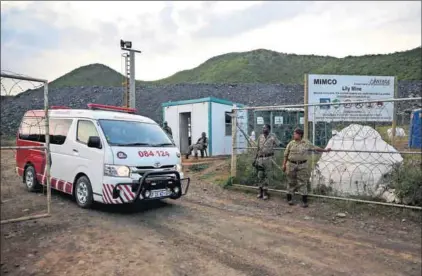  ?? Photo: Siphiwe Sibeko/Reuters ?? Tough times: Employees want their unpaid salaries and allowances, but the mine has been closed since the accident. Managers paid each worker R1 000 from their own pockets.