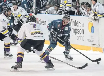  ??  ?? Stars’ Cale Tanaka comes under pressure from Storm’s Mario Trabucco and Connor Varley.