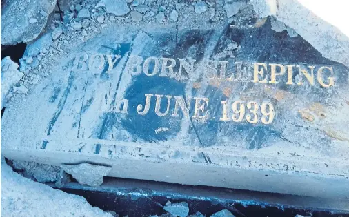  ??  ?? GRIM: Gravestone­s were among rubble delivered to Peterhead Lido Caravan Park and used as material to mark out an extension