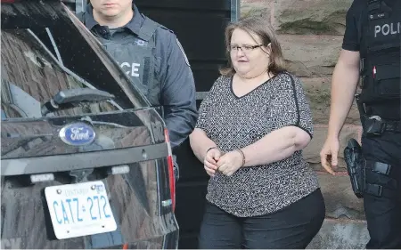  ?? MORRIS LAMONT/THE LONDON FREE PRESS ?? Elizabeth Wettlaufer, the former seniors’ home nurse who was convicted in the murder of eight elderly people under her care in Woodstock, Ont., leaves the Oxford County Court House after being sentenced to life in prison on Monday.