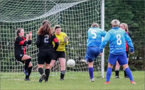  ??  ?? Kim Walker scores for North End United during their recent Division 1 game against All Blacks.