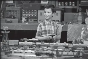  ??  ?? Young Sheldon stars Iain Armitage (Big Little Lies) as 9-year-old genius Sheldon Cooper. He’s shown here in his favorite pastime, playing with trains.