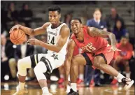  ?? Mark Humphrey / Associated Press ?? Vanderbilt forward Aaron Nesmith (24) works against SMU forward Isiaha Mike during a game last season in Nashville, Tenn. Nesmith was selected by the Boston Celtics in the NBA draft on Wednesday.