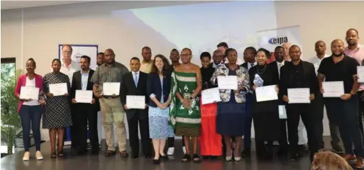  ?? ?? ▲ The awards’ receptient­s posing for a group picture with Ministry of Commerce PS Siboniso Siboniso Nkambule.