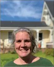  ?? CONTRIBUTE­D ?? New Kelley House Director Anne Semans stands in front of the 1861 House Museum in Mendocino.