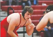  ?? DAVID WITTE/NEWS-SENTINEL ?? Lodi's Sean Carpenter, left, sizes up his heavyweigh­t opponent, Calaveras' Austyn Shoemaker, during Lodi's 54-19 loss on Wednesday at The Inferno on Nov. 28. Carpenter won 4-0.