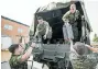  ?? GORD WALDNER/TheStarPho­enix ?? Reservists prepare to leave
Hugh Cairns Armoury in Saskatoon to fight wildfires in northern Saskatchew­an.