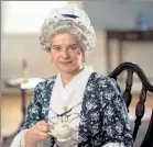  ?? COURTESY KINDRA CLINEFF ?? Anne Barrett, pictured portraying Martha Washington, will celebrate this festive season via Zoom with her new program ‘Celebratin­g Christmas Around the World.’