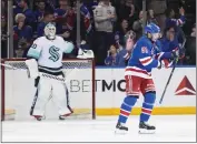  ?? FRANK FRANKLIN II — THE ASSOCIATED PRESS ?? Vladimir Tarasenko, right, skates past Kraken goaltender Martin Jones after scoring in his Rangers debut Friday.