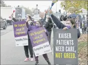  ?? JOEL ROSENBAUM —THE REPORTER ?? Members of SEIU-UHW who work at Kaiser Permanente Vacaville Medical Center walked out in sympathy on Thursday to support engineers, who have been striking for about two months over wage disputes.