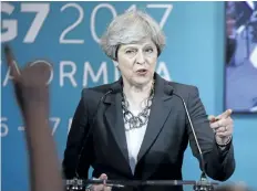  ?? LUCA BRUNO/THE ASSOCIATED PRESS FILES ?? British Prime Minister Theresa May speaks during a news conference in the Sicilian town of Taormina, Italy.