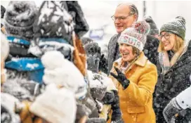  ?? PHOTO BY GLEN STUBBE/STAR TRIBUNE VIA AP ?? U.S. Sen. Amy Klobuchar greets supporters after her speech, as she is accompanie­d by her daughter Abigail and husband, John, on Sunday in Minneapoli­s.