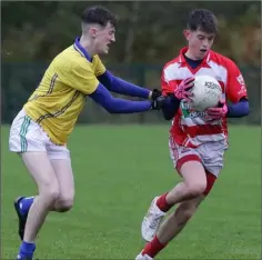  ??  ?? Jordan Donovan of St. Mary’s is tackled by Enda Kelly (GOH).