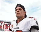  ?? KIM KLEMENT/USA TODAY SPORTS ?? A viral moment of Tampa Bay Buccaneers quarterbac­k Tom Brady and his son has spurred debate about fatherhood and masculinit­y.