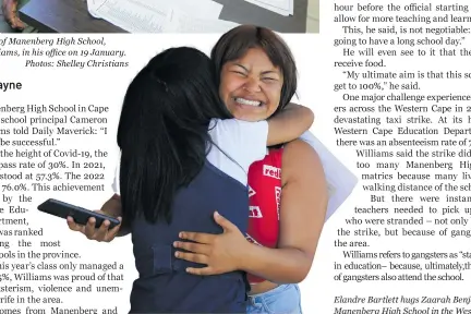  ?? ?? Elandre Bartlett hugs Zaarah Benjamin (right) after receiving their matric results at Manenberg High School in the Western Cape on 19 January.