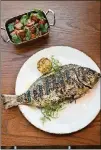  ?? CONTRIBUTE­D BY MIA YAKEL ?? Donetto’s whole roasted fish is served with lemon and herbs.