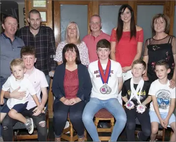  ??  ?? Mark, Bobby and Conor with members of the O’Keeffe family.