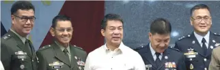  ??  ?? SENATE PRESIDENT and Commission on Appointmen­ts Chair Aquilino Martin L. Pimentel III with newly promoted military officers.