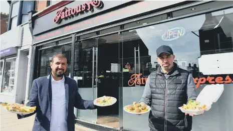  ??  ?? Abdullah Aldarwech (left) and Ahmed Kurkmas outside of Fatoush, Chester Road, Sunderland. Pictures by FRANK REID