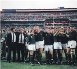  ??  ?? Scenes from the 1995 Rugby World Cup final at Ellis Park: Joost van der Westhuizen tackles Jonah Lomu; Nelson Mandela hands captain Francois Pienaar the Webb Ellis trophy; members of the victorious Springbok team celebrate after beating the All Blacks 15-12; a beaming Madiba in his Springbok No 6 jersey; and lock Kobus Wiese loses the ball as All Black Robin Brook challenges him.