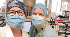  ??  ?? Carrie Homuth, with clinical nurse leader Ryanna Salvador: “It was stressful … it seemed like every day was a gift to get a little more preparatio­n done and now it’s a gift that the worst hasn’t happened.”