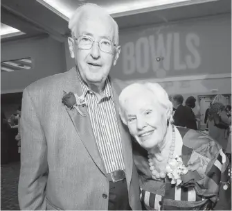  ??  ?? Souper Bowls founder Helen Hughes with her husband, retired judge Ted Hughes.