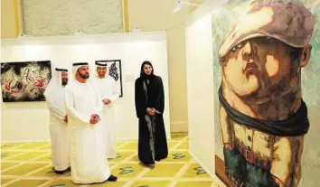  ?? Virendra Saklani/Gulf News ?? Noble cause Eisa Al Maidour and Saeed Al Naboudah, acting director-general of Dubai Culture, at the Noor Dubai Art4Sight exhibition and auction.