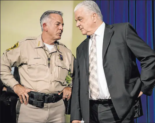  ?? Erik Verduzco Las Vegas Review-journal ?? In the race for governor, Real Clear Politics puts Clark County Sheriff Joe Lombardo, left, ahead of Gov. Steve Sisolak, right, 45.3 percent to 43.7 percent. Lombardo and Sisolak are seen together during a 2017 news conference about the Las Vegas mass shooting.