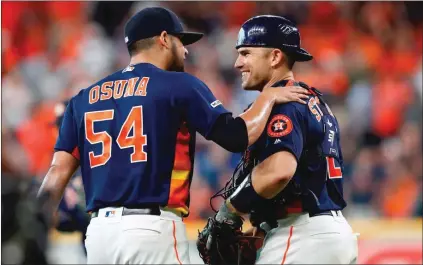  ?? Getty Images/tns ?? The Angels added some depth at catcher by acquiring Matt Stassi, right, from the Houston Astros shortly before the MLB trading deadline on Wednesday.