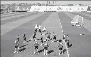  ??  ?? Real Madrid’s players take part in a training session at Valdebebas training ground in Madrid on the eve of the Spanish League Clasico match against Barcelona. — AFP photo