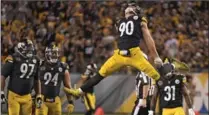  ?? FRED VUICH, THE ASSOCIATED PRESS ?? Pittsburgh Steelers outside linebacker T.J. Watt (90) celebrates his sack of Cincinnati Bengals quarterbac­k Andy Dalton. The Steelers won, 29-14.