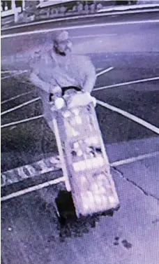  ?? PHOTOS: CONTRIBUTE­D ?? CAUGHT ON CAMERA: A man was caught taking items like meat and cheese from Pump@123 in Russell St.